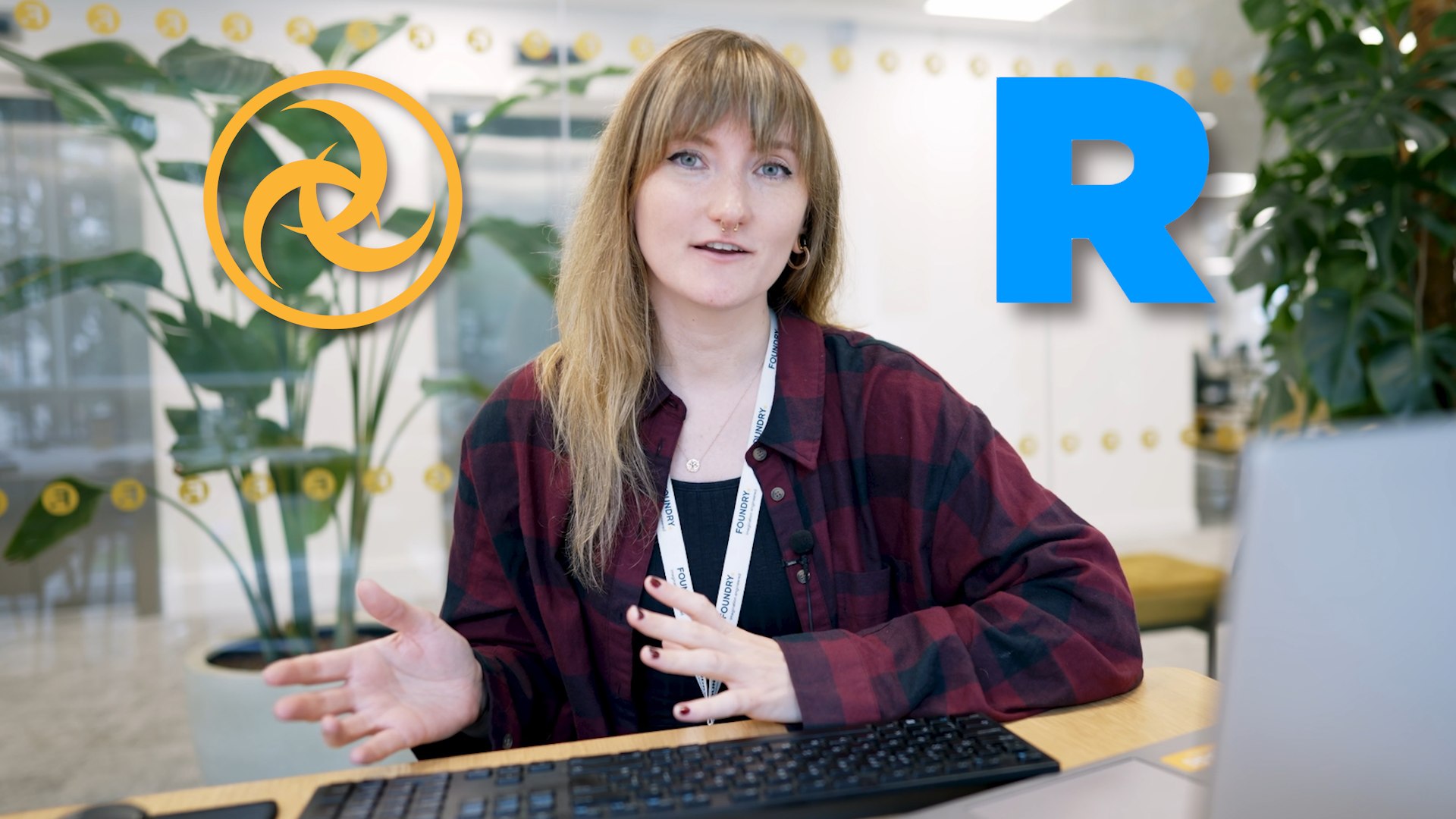 Ruth presenting on camera between the Katana and RenderMan logos