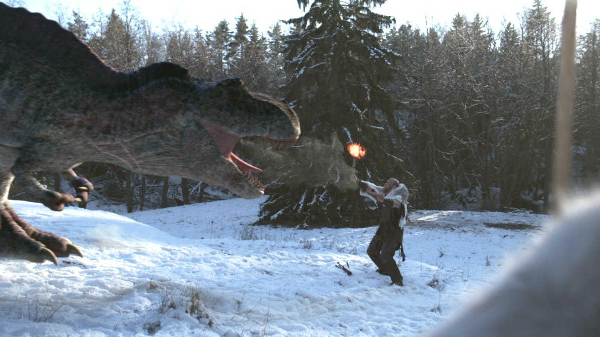 Katana USD workflows playlist, showing a dinosaur breathing fire at a figure in a snowy forest
